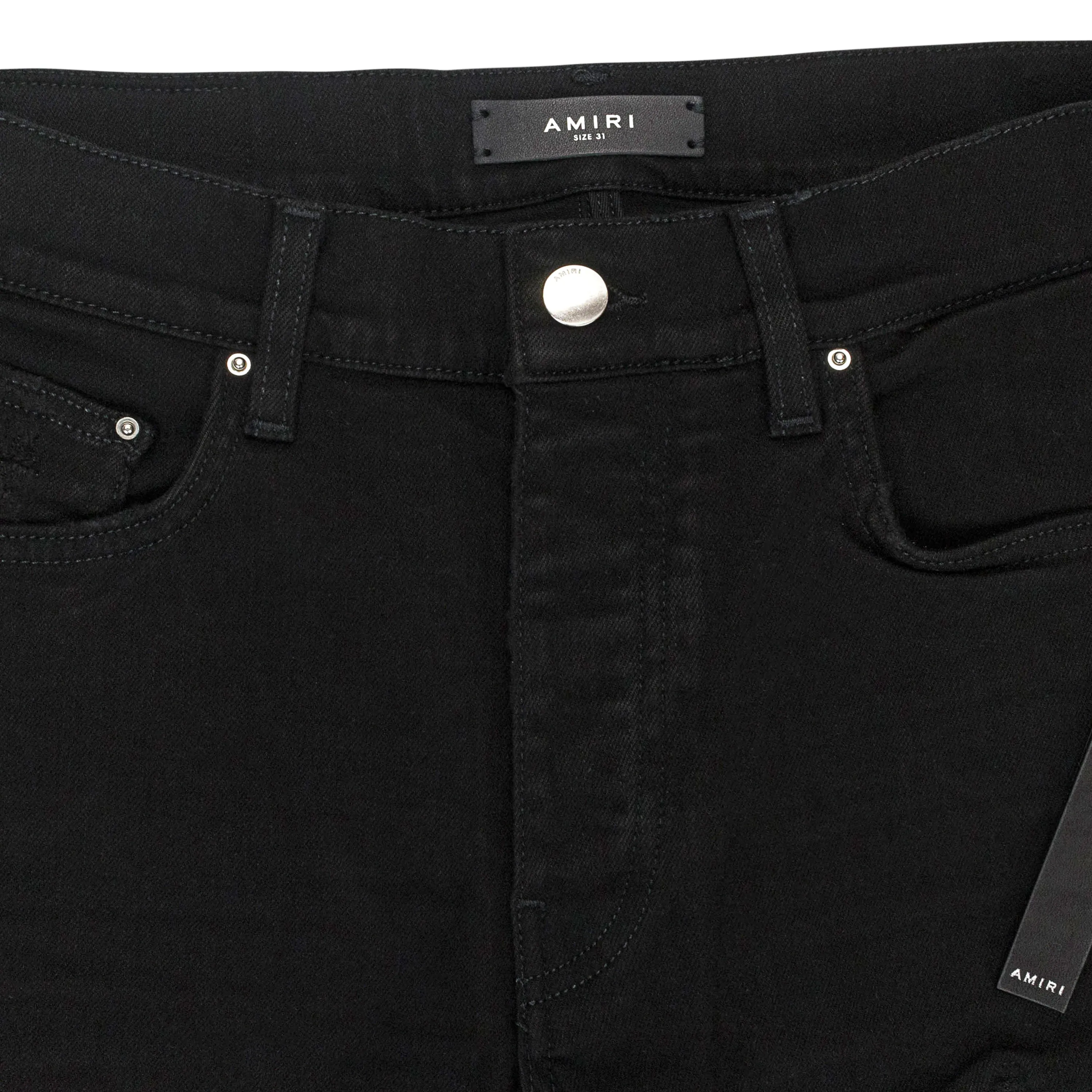 AMIRI MX1 ULTRA SUEDE BUTTON FLY SKINNY JEANS