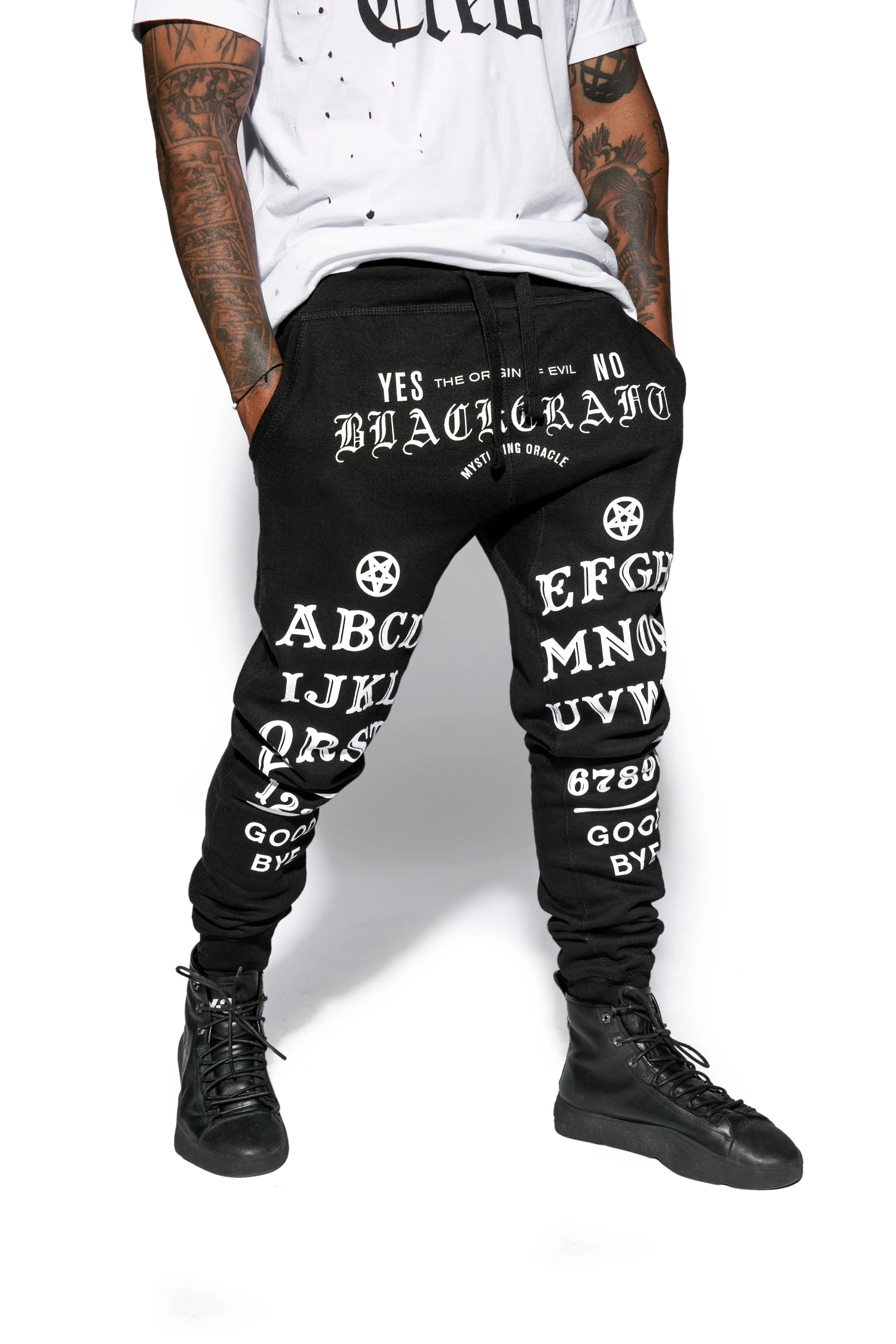 Certainly! Heres an optimized title for the product in English with modifiers:

Ouija Inspired High-Performance Joggers - Stylish & Comfortable Activewear for Men and Women
