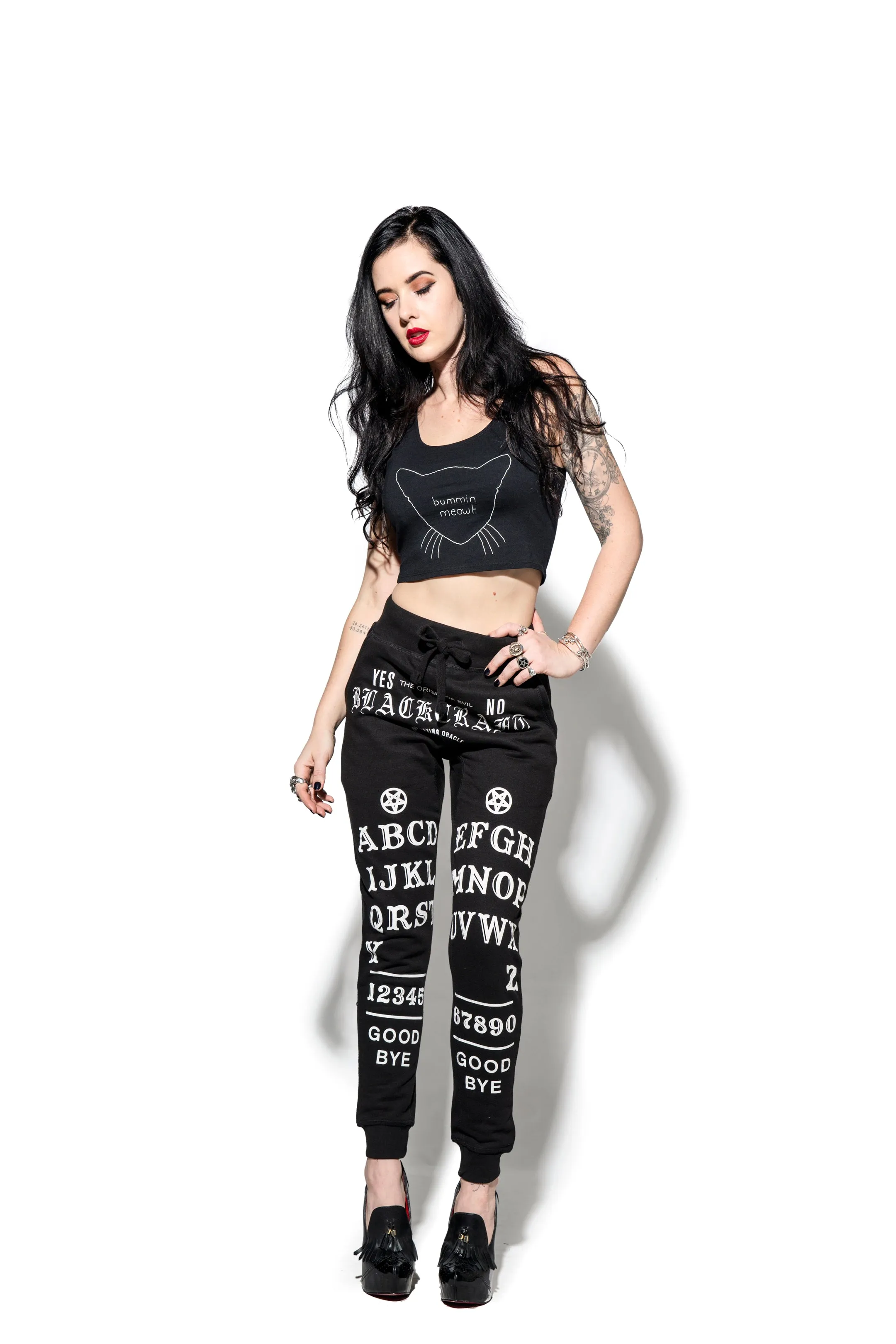 Certainly! Heres an optimized title for the product in English with modifiers:

Ouija Inspired High-Performance Joggers - Stylish & Comfortable Activewear for Men and Women