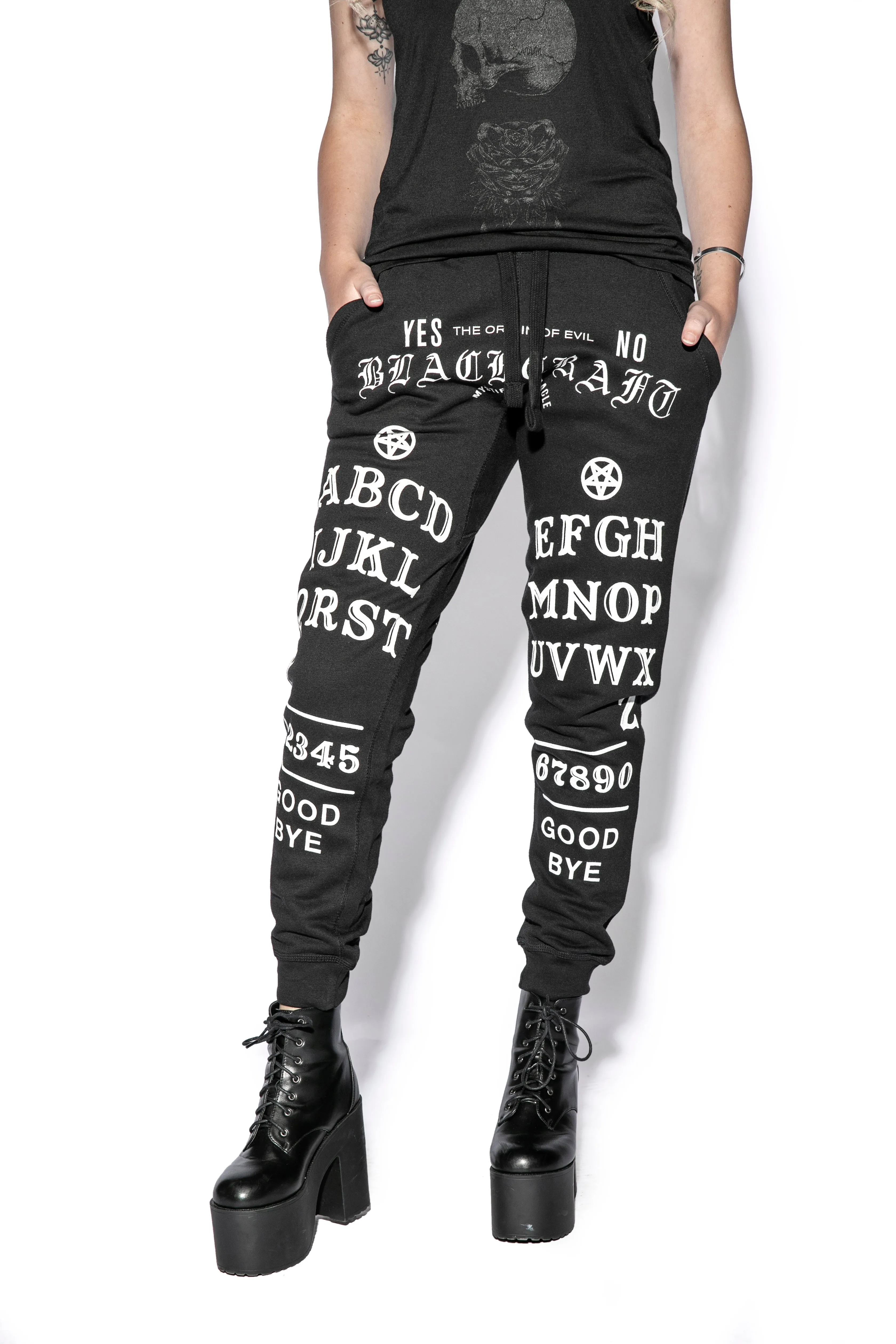 Certainly! Heres an optimized title for the product in English with modifiers:

Ouija Inspired High-Performance Joggers - Stylish & Comfortable Activewear for Men and Women